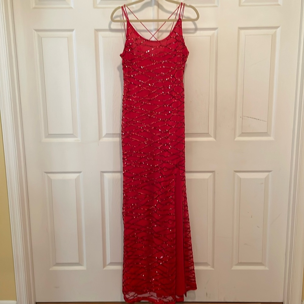 Red Sequin dress . Spaghetti strap with crisscross.